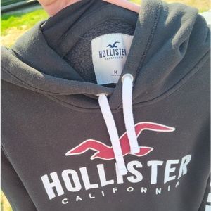 Black mens size medium Hollister hooded sweatshirt .